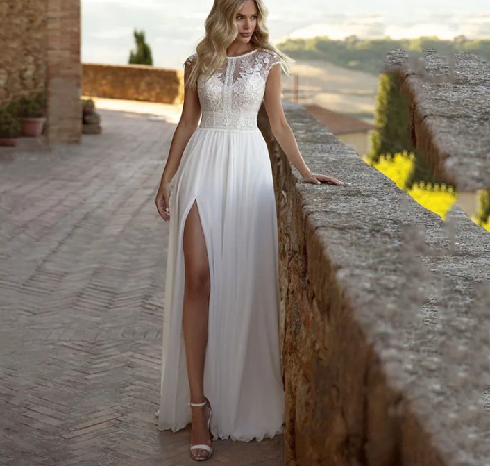 Ärmelloses Boho Chiffon Brautkleid Innozentia mit Spitze und Cut Out